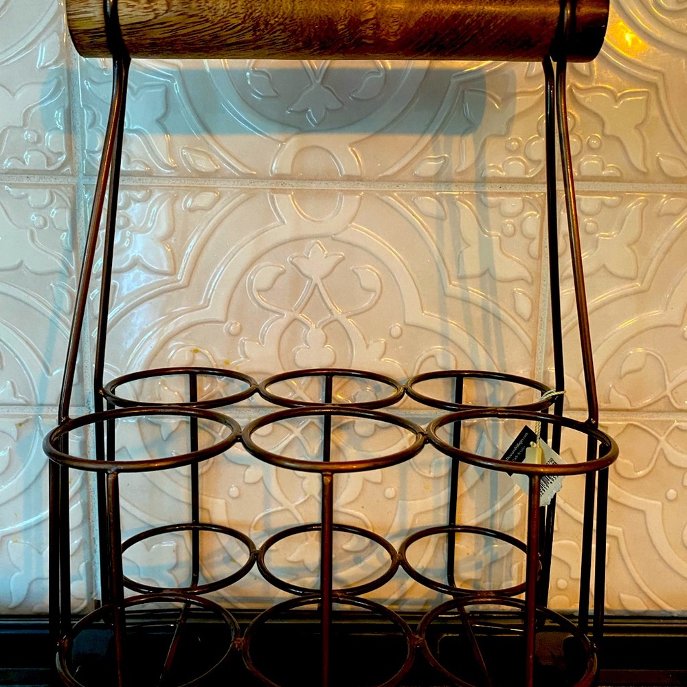 Bottle carrier, decorative from Ten Thousand Villages